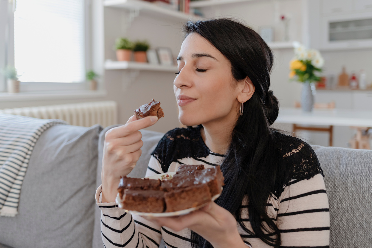 Woman Eating Chocolate Cake